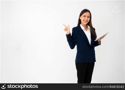 Young beautiful business woman pointing up at copy space and looking at the camera over isolated background cheerful with smile on face. Concept of advertising marketing and product placement concept