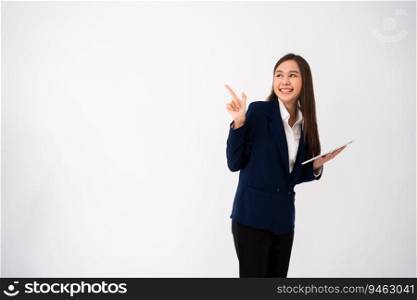 Young beautiful business woman pointing up at copyspace and looking at on pointing over isolated background cheerful with smile on face. Concept of advertising marketing and product placement concept