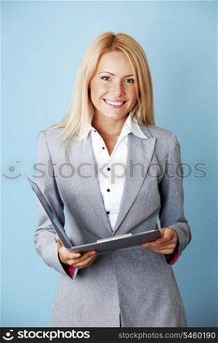 Young beautiful business woman with folder