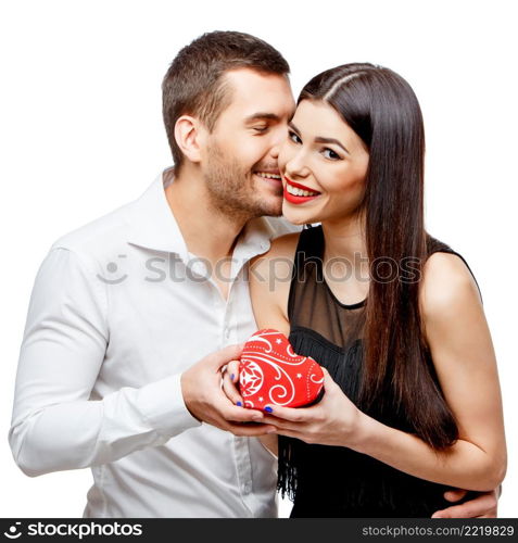 Young beautiful caucasian couple with present isolated on white. Young beautiful couple with present isolated on white