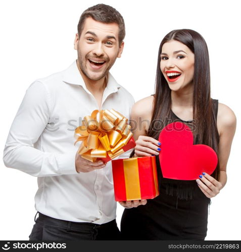 Young beautiful caucasian couple with present isolated on white. Young beautiful couple with present isolated on white