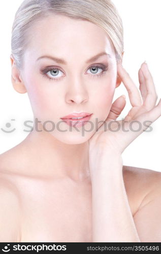 young beautiful caucasian woman with natural makeup posing in the studio