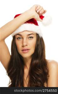 young beautiful christmas woman wearing santas hat. young beautiful christmas woman wearing santas hat on white background