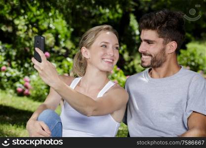 young beautiful couple making a selfie