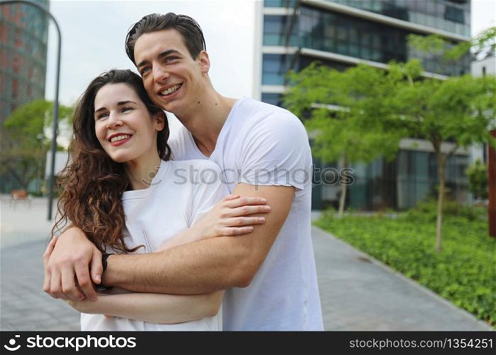 Young beautiful couple posing wearing jeans and t-shirt