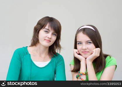 young beautiful european girls smile and look into camera