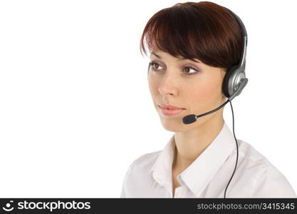 Young beautiful female customer service operator with wired headset isolated on white background