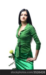 Young beautiful girl in green with a yellow rose on tne white background