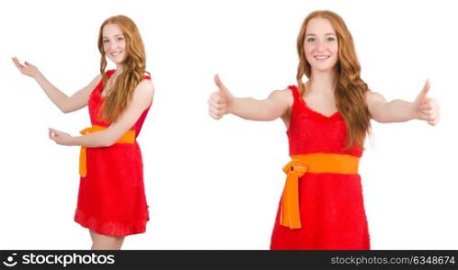 Young beautiful girl in red dress pointing isolated on white