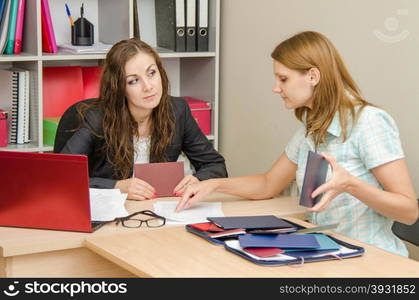 Young beautiful girl on reception at the office specialist