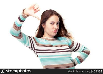 Young beautiful girl showing thumb down, isolated on white
