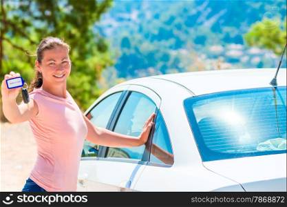 young beautiful girl took a white car rental