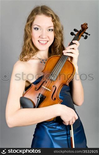 young beautiful girl with a violin