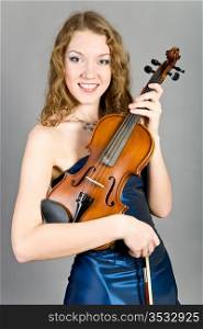 young beautiful girl with a violin