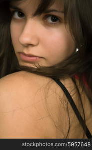 young beautiful pensive woman close up portrait&#xA;