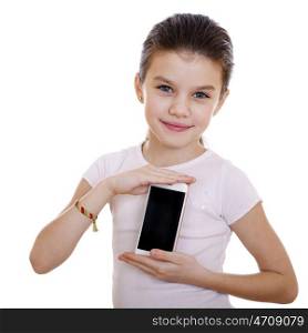Young beautiful schoolgirl shows a new smart phone, isolated on white background