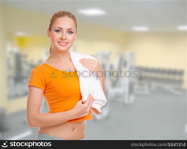 Young beautiful smiling sporty woman