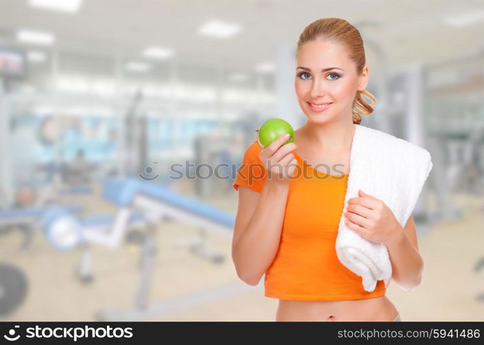 Young beautiful smiling sporty woman