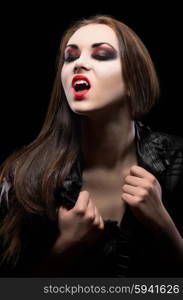 Young beautiful vampire woman isolated