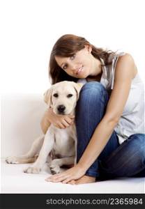 Young beautiful woman at home with her cute dog