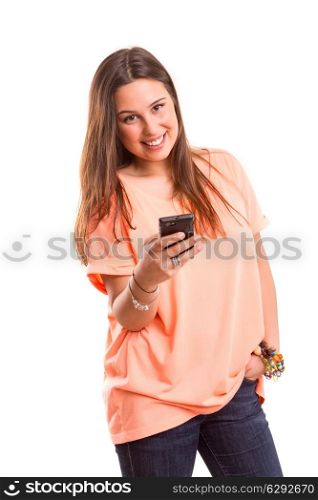 Young beautiful woman at the phone, isolated over a white background