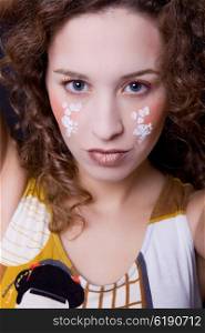 young beautiful woman close up portrait with painted face