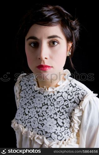 young beautiful woman dressed as bride on a black background