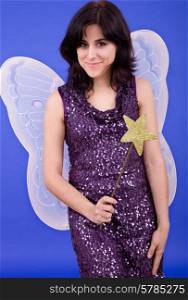 young beautiful woman dressed as tinkerbell, studio picture