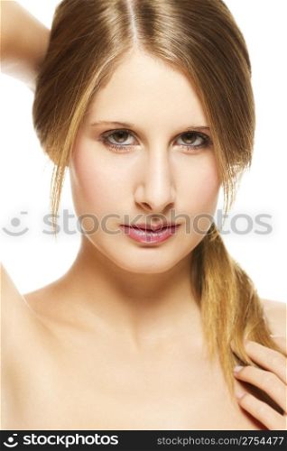 young beautiful woman holding her pigtail. young beautiful woman holding her pigtail on white background