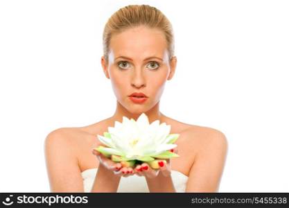 Young beautiful woman holding lotus flower in hands isolated on white&#xA;