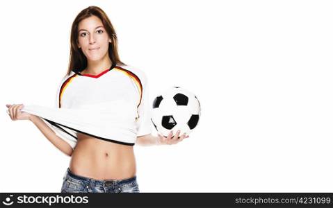 young beautiful woman holding soccer ball pulling on her football shirt. young beautiful woman holding soccer ball pulling on her football shirt on white background
