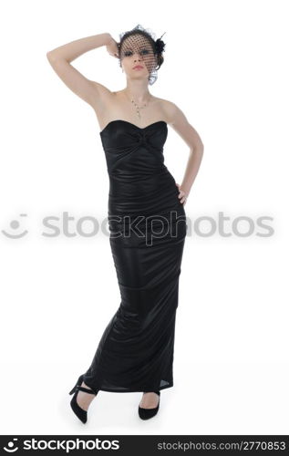 Young beautiful woman in a full-length in evening gown. Isolated on white background