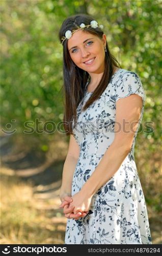Young beautiful woman in autumn forest