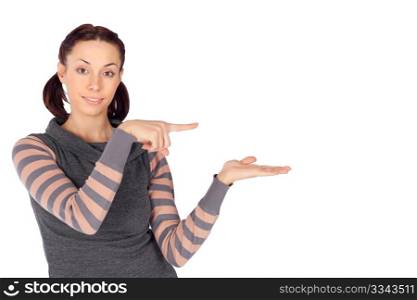 Young beautiful woman in casual clothing showing something on the right, isolated on white background.