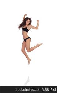 Young beautiful woman in cotton underwear jumping on white background