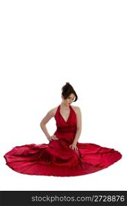 young beautiful woman in red evening dress. young beautiful woman in red evening dress sitting on floor