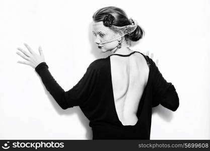 Young beautiful woman in the veil on a white background