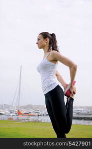 Young beautiful woman jogging and running on morning at park in the city. Woman in sport outdoors health and fitness concept