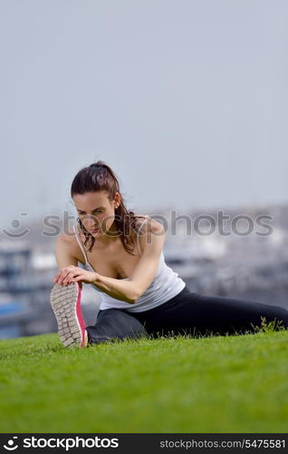 Young beautiful woman jogging and running on morning at park in the city. Woman in sport outdoors health and fitness concept