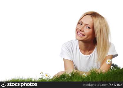 Young beautiful woman laying on daisy flowers field isolated on white background