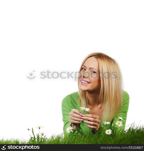 Young beautiful woman laying on daisy flowers field isolated on white background