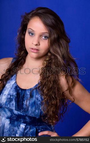 young beautiful woman, on a blue background