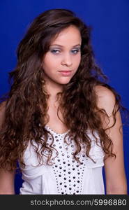 young beautiful woman, on a blue background