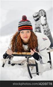 Young Beautiful Woman on sledge