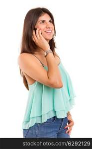 Young beautiful woman on the phone, isolated over a white background