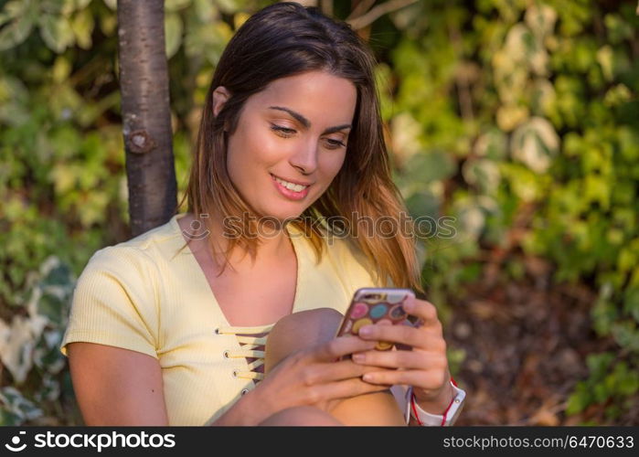 young beautiful woman on the phone, outdoor. woman on the phone