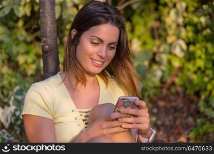 young beautiful woman on the phone, outdoor. woman on the phone