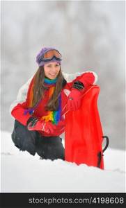 Young Beautiful Woman play in winter time