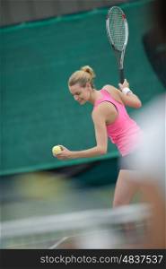 young beautiful woman playing tennis