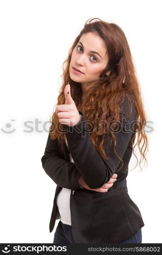 Young beautiful woman pointing at you, isolated over white